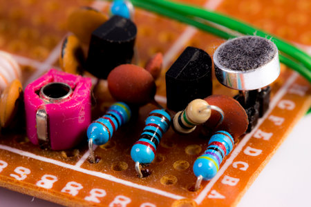 circuit board with soldered radio components, resistors, transistors, diodes, inductors and...