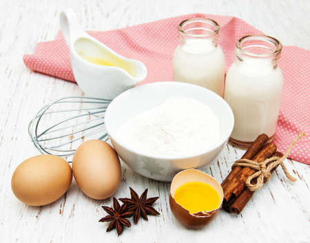 Baking ingredients on a old wooden backgroundの写真素材