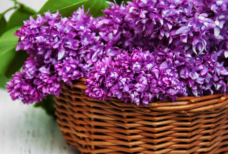 Lilac flowers in a basket - close upの写真素材