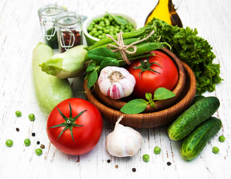 various vegetables on a old wooden backgroundの写真素材
