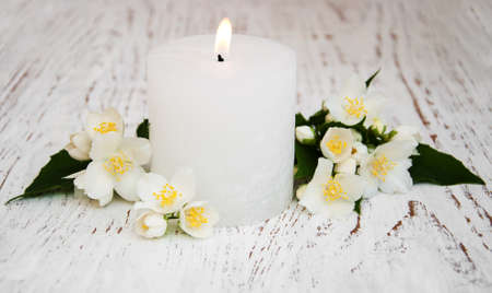 Spa concept with jasmine flowers on a old wooden backgroundの写真素材