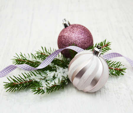 christmas decoration baubles and a branch of pine treeの写真素材