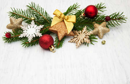 christmas decoration baubles and a branch of pine treeの写真素材