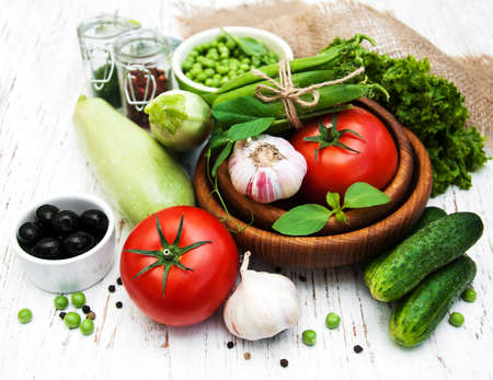 various vegetables on a old wooden backgroundの写真素材