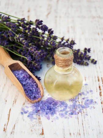 Lavender, sea salt and oil on a wooden backgroundの写真素材