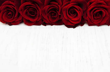Fresh Red roses on a old wooden backgroundの写真素材