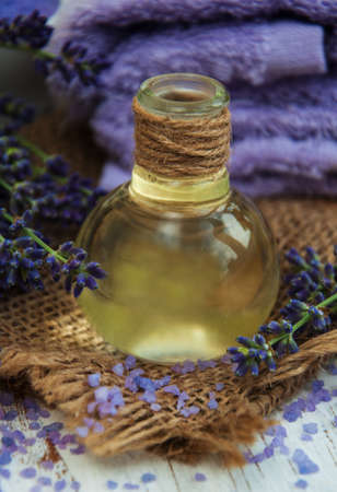 Lavender, sea salt and oil on a wooden backgroundの写真素材