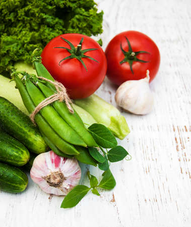 various vegetables on a old wooden backgroundの写真素材