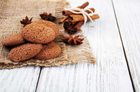 healthy oatmeal cookies on a old wooden tableの写真素材