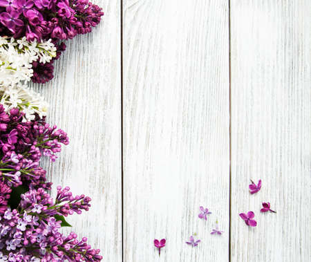 Lilac flowers on a old wooden backgroundの写真素材