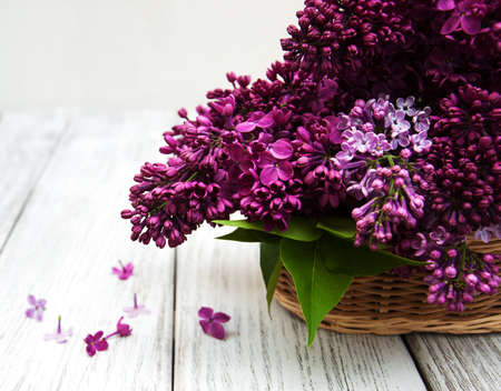 Lilac flowers on a old wooden backgroundの写真素材