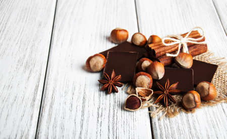 chocolate with nuts on a old wooden table