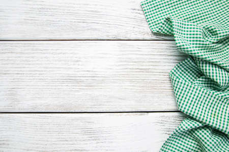 Green napkin on the old wooden backgroundの写真素材