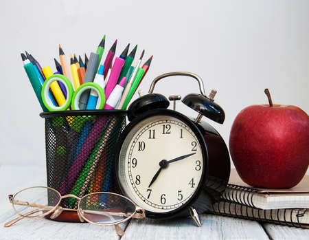 School office supplies on a wooden tableの写真素材