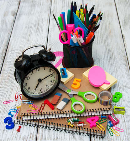 School office supplies on a wooden tableの写真素材