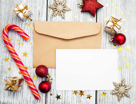 Greeting card with envelope and christmas  baublesの写真素材