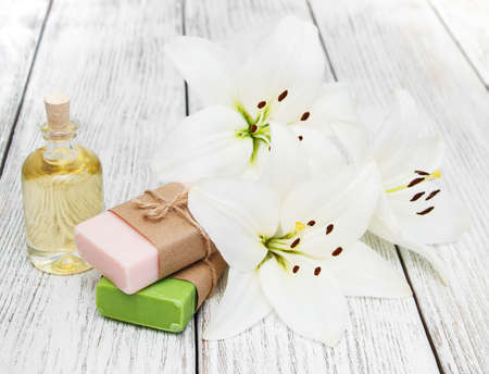 Wellness and spa scene with lily and massage oilの写真素材