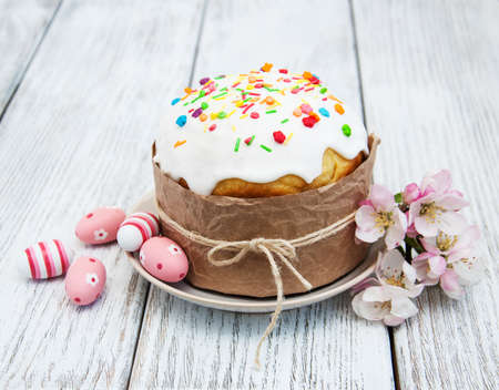 Easter bread and eggs with apple blossomの写真素材