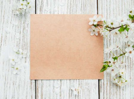 Spring   blossom and card on a old wooden tableの写真素材