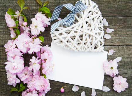 Sakura blossom with heart on a old wooden tableのeditorial素材