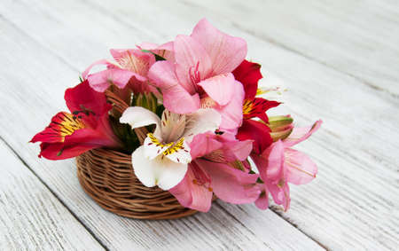 beautiful bouquet of pink alstroemeria in the basketの写真素材