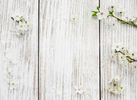 Spring cherry  blossom on a old wooden tableの写真素材