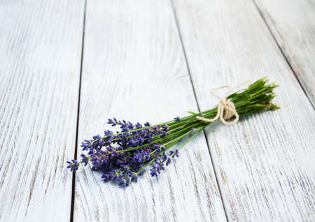 bunch of lavender on a old wooden backgroundの写真素材
