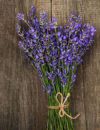 bunch of lavender on a old wooden backgroundの写真素材