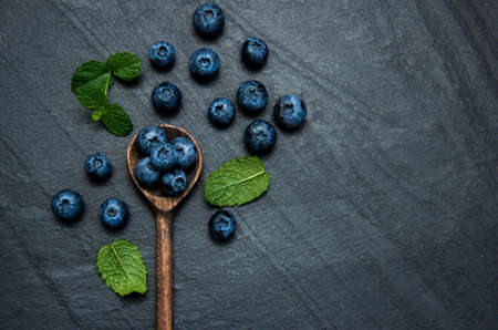 Fresh blueberries on a black  stone backgroundの写真素材