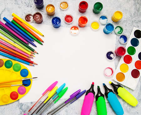 Back to school concept - school supplies on a table