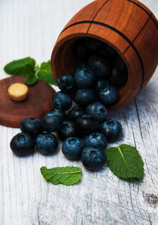 Fresh blueberries on a old wooden tableの写真素材