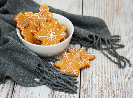 Christmas ginger and honey cookies on a old wooden tableの写真素材
