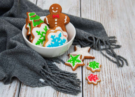 Christmas ginger and honey cookies on a old wooden tableの写真素材