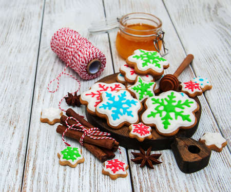 Christmas ginger and honey cookies on a old wooden tableの写真素材