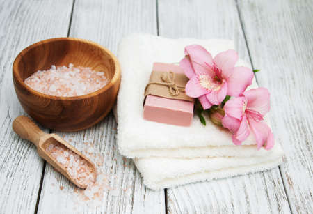 Spa composition with alstroemeria flowers on wooden backgroundの写真素材
