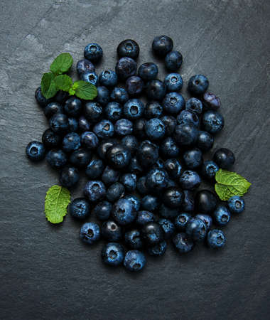 Fresh blueberries on a black  stone backgroundの写真素材