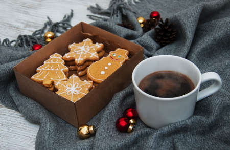 Box with Christmas cookies  on a old wooden tableの写真素材
