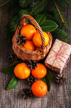 Christmas composition with tangerines and gift boxの写真素材