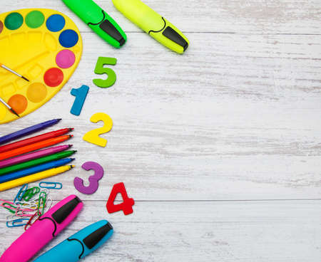 Back to school concept - school supplies on a table
