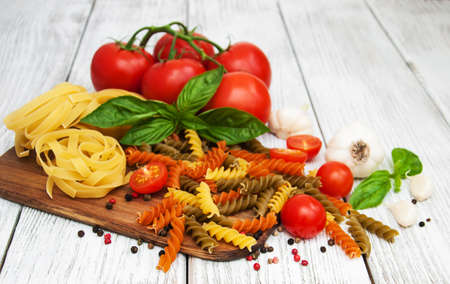 italian food ingredients on a old wooden backgroundの写真素材
