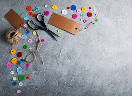 items for sewing on a gray stone backgroundの写真素材