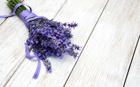 bunch of lavender on a old wooden backgroundの写真素材