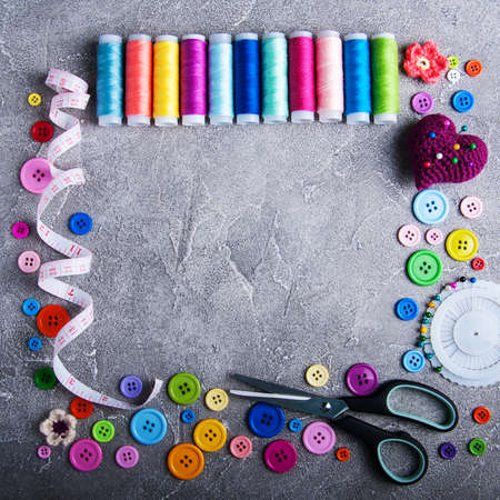 Set of accessories for tailoring on a tableの写真素材