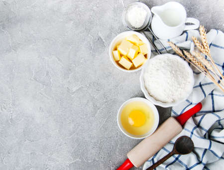 Top view of  kitchen table with various ingredients for baking cake