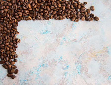 Coffee beans on a grey stone backgroundの写真素材