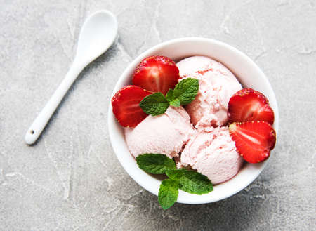 Strawberry ice cream  on a stone background