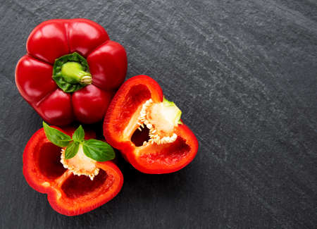 Bell peppers on a wooden background