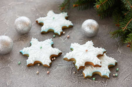 Christmas homemade gingerbread cookies on a concrete background