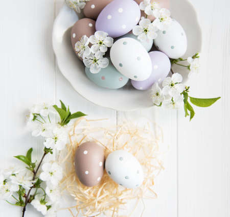 Plate with easter eggs and spring blossom