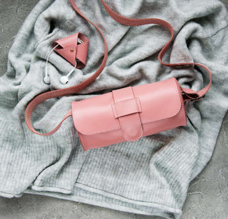 Pink leather woman bag and accessories - flat layの写真素材